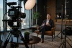 A professional two-camera interview setup by H&K Cinema, featuring intentional lighting, clean composition, and a cinematic production environment designed for brand films, testimonial videos, and commercial storytelling across Dallas–Fort Worth.
